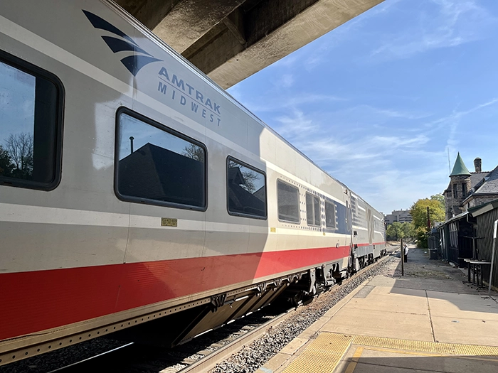 What does segment mean on Amtrak? Selfie of author & travel blogger Michael DeFranceschi in front of an Amtrak train.