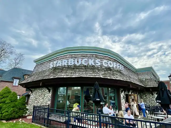The exterior of the Starbucks in downtown Northville is covered in stone.